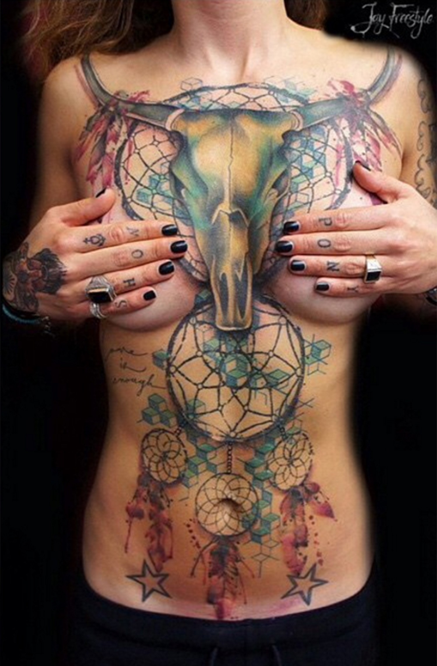 Woman boob tattoos