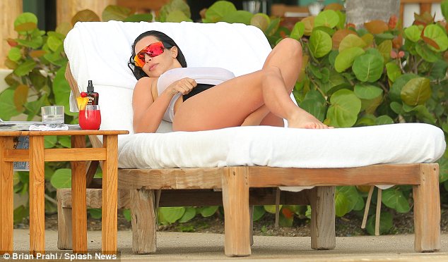 Kim Kardashian Squeezes In Some Work Before Jetting Off For Honeymoon