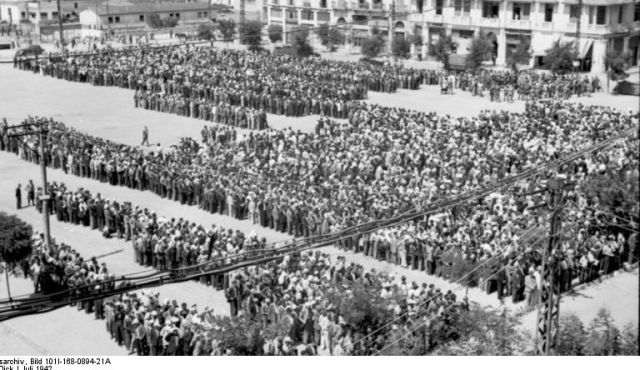 The male Jews of Thessaloniki are registered in the town square, July 1942. Photo by Bundesarchiv via Wikimedia Commons