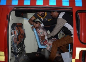 LAHORE, PAKISTAN - MARCH 27: An injured woman is taken to a hospital after a suicide bomber blew himself up in a crowded park in Lahore, killing at least 56 people and injuring 120 others in Pakistan on March 27, 2016. According to police, the bomber detonated his explosive-laden vest in a crowded area of Gulshan-e-Iqbal Park, located in a northern district of Lahore, Pakistans second largest city and the regional capital of Punjab province.  Rana Irfan Ali / Anadolu Agency