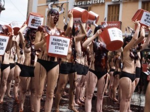 SPAIN, Pamplona: PETA and Anima Naturalis association members stage a protest against bullfights in Pamplona, Spain on July 5, 2016 ahead of San Fermin bull running festival. - Eduardo Sanz Nieto
