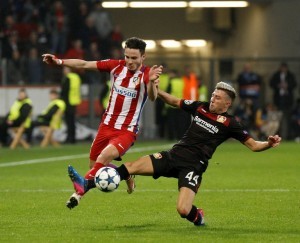 LEVERKUSEN, GERMANY - FEBRUARY 21: Kevin Kampl (R) of Bayer Leverkusen in action against Saul Niguez (L) of Atletico Madrid during the UEFA Champions League round of sixteen soccer match between Bayer 04 Leverkusen and Atletico Madrid at the BayArena in Leverkusen, Germany on February 21, 2017.  Leon Kuegeler / Anadolu Agency