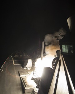 In this image released by the US Navy, the USS Ross fires a tomahawk land attack missile April 7, 2017, at a Syrian air force airfield . US President Donald Trump ordered a massive military strike on a Syrian air base on Thursday in retaliation for a "barbaric" chemical attack he blamed on President Bashar al-Assad. / AFP PHOTO / US NAVY / Robert S. PRICE / RESTRICTED TO EDITORIAL USE - MANDATORY CREDIT "AFP PHOTO / US NAVY / Mass Communication Specialist 3rd Class Robert S. Price" - NO MARKETING NO ADVERTISING CAMPAIGNS - DISTRIBUTED AS A SERVICE TO CLIENTS