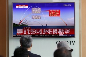epa06169428 South Koreans watch a television displaying news broadcasts reporting on North Korea's latest ballistic missile launch, at a station in Seoul, South Korea, 29 August 2017. According South Korea's Joint Chiefs of Staff (JCS), North Korea fired a ballistic missile over Japan, eastward from the vicinity of Sunan in Pyongyang around 5:57am local time.  EPA/JEON HEON-KYUN
