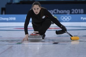 Russia's Anastasia Bryzgalova watches the stone during the curling mixed doubles semi-final during the Pyeongchang 2018 Winter Olympic Games at the Gangneung Curling Centre in Gangneung on February 12, 2018. / AFP PHOTO / WANG Zhao