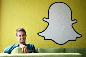 FILE - In this Thursday, Oct. 24, 2013, file photo, Snapchat CEO Evan Spiegel poses for a photo in Los Angeles. Tax-filing season is turning into a nightmare for thousands of employees working at companies tricked into relinquishing tax documents exposing people’s incomes, addresses and Social Security numbers to scam artists. In fact, in a Feb. 28, 2016, post on its corporate blog, Snapchat revealed that its payroll department had been duped by an email impersonating Spiegel. (AP Photo/Jae C. Hong, File)