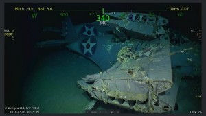 This handout photograph obtained March 5, 2018 courtesy of Paul G. Allen shows wreckage from the USS Lexington, a US aircraft carrier which sank during World War II, that has been found in the Coral Sea, a search team led by Microsoft co-founder Paul G. Allen announced March 5, 2018.   The wreckage was found March 4, 2018 by the team's research vessel, the R/V Petrel, some 3,000 meters (two miles) below the surface more than 500 miles (800 kilometers) off the eastern coast of Australia. Remarkably preserved aircraft could be seen on the seabed bearing the five-pointed star insignia of the US Army Air Forces on their wings and fuselage.  / AFP PHOTO / PAUL G. ALLEN / STR / == RESTRICTED TO EDITORIAL USE  / MANDATORY CREDIT:  "AFP PHOTO /  HO / COURTESY OF PAUL G. ALLEN" / NO MARKETING / NO ADVERTISING CAMPAIGNS /  DISTRIBUTED AS A SERVICE TO CLIENTS  ==