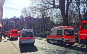 Ambulances  stand in downtown Muenster, Germany, Saturday, April 7, 2018. German news agency dpa says several people killed after car crashes into crowd in city of Muenster.  (dpa via AP)