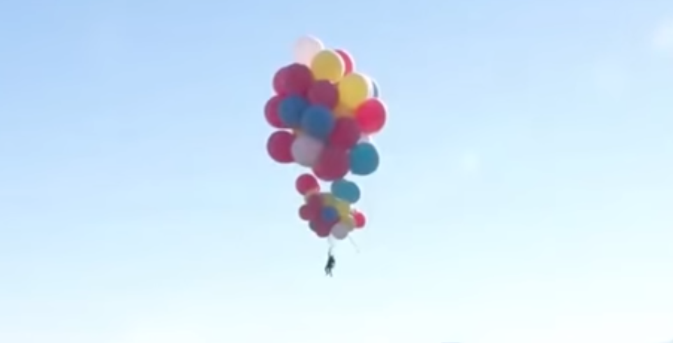 David Blaine successfully flies over the Arizona desert holding onto ...