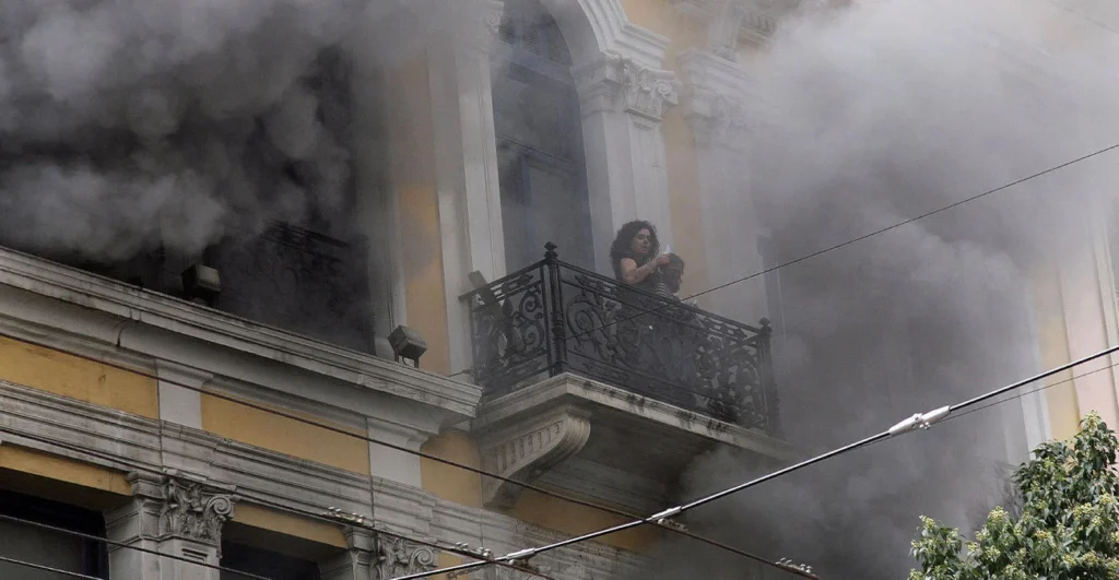 Two men arrested over 2010 Marfin bank firebombing that killed three, third sought in Britain