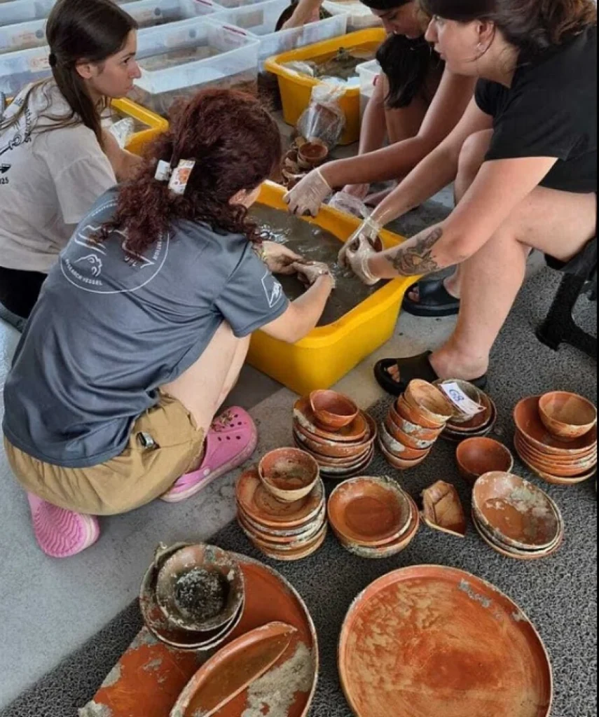 Roman-era ceramic vessels, plates, bowls and trays found in a 2,100 ...